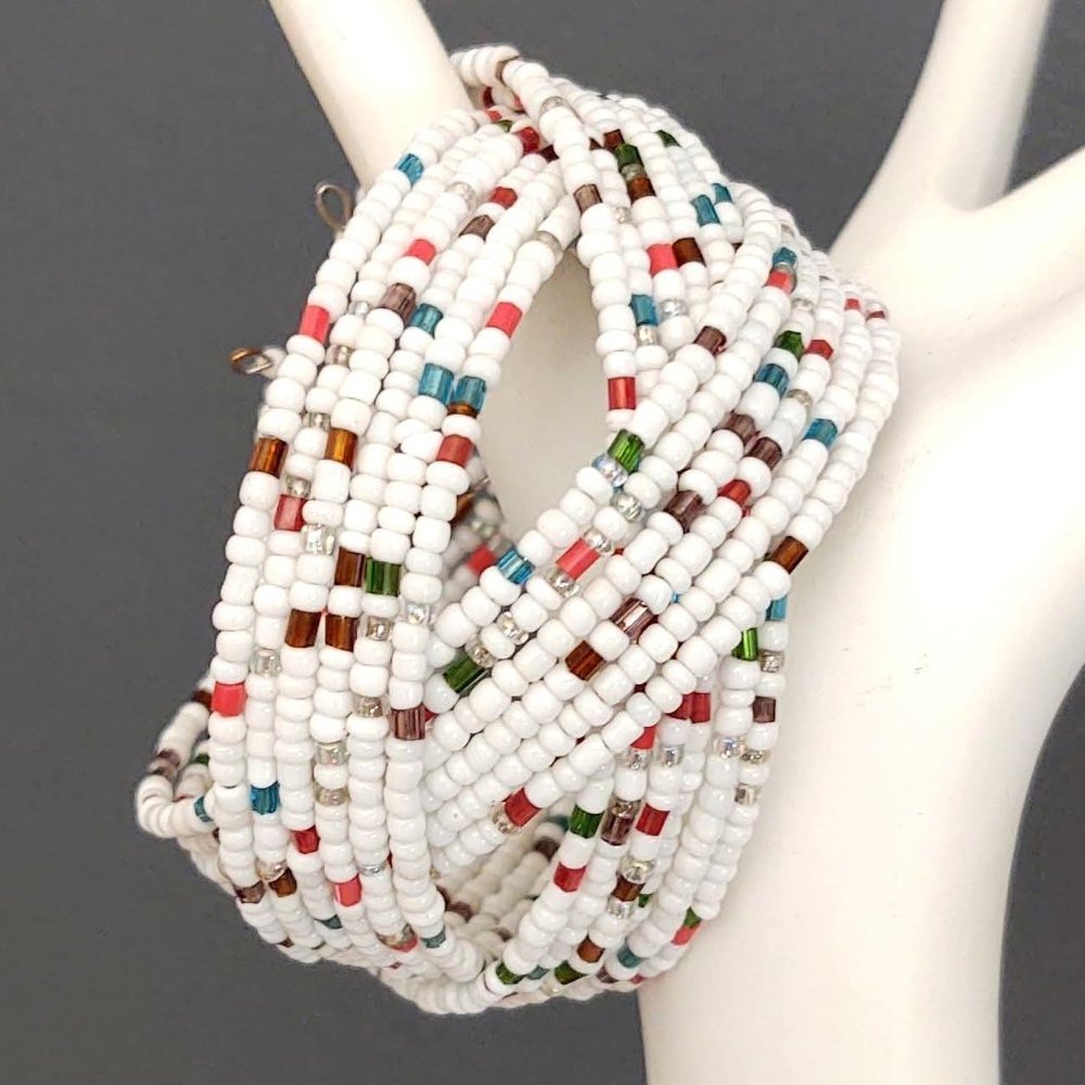 White seed bead cuff with multi color accents